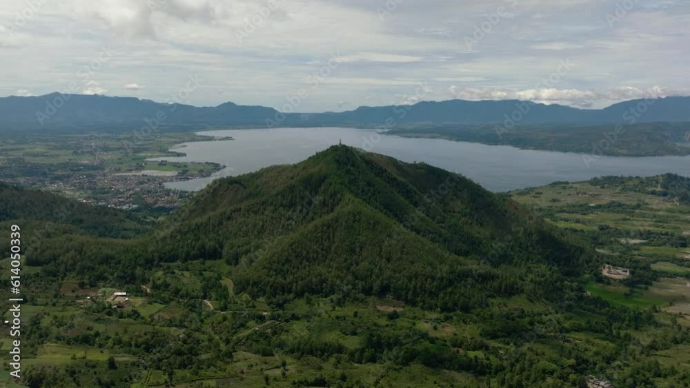 Lake Toba and farmland in the highlands view from above. Sumatra, Indonesia. Lake Toba and farmland in the highlands view from above. Sumatra, Indonesia.