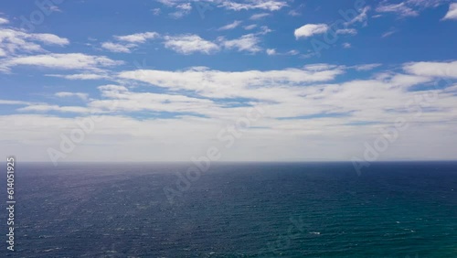 Wallpaper Mural Seascape, aerial view. Flight over the sea. Blue sea and sky with clouds. Summer and travel vacation concept. Torontodigital.ca