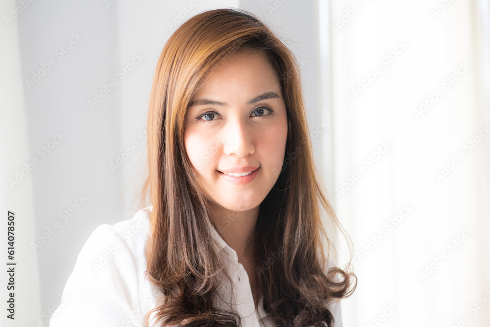 Portrait of beautiful business luxury look asian woman sitting in cozy room