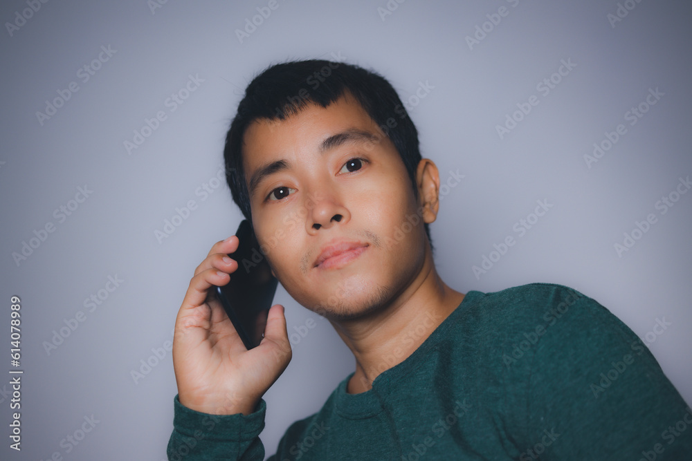 Young man using mobile smartphone. copy spaec. Young man using mobile smartphone. copy spaec.