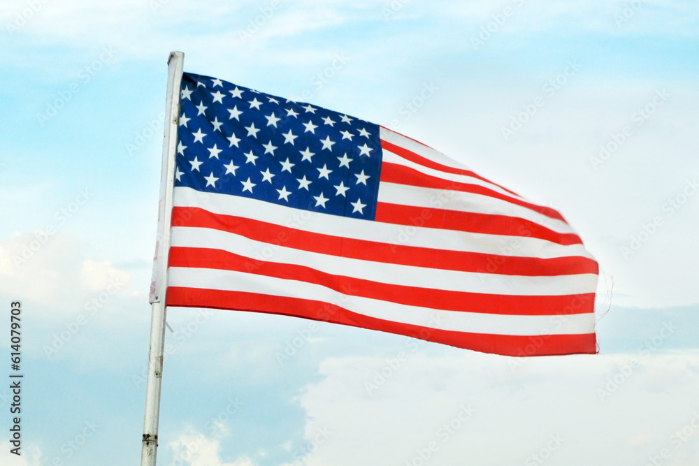 American Flag Wave CloseUp in blue sky background, United States Of America Flat Flags