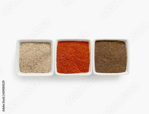 Fototapeta Naklejka Na Ścianę i Meble -  Bowls of fresh aromatic spices on white background