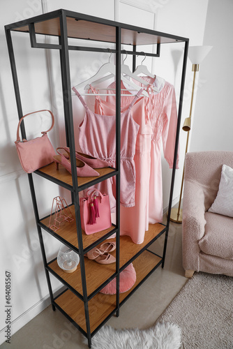 Shelving unit with clothes,...