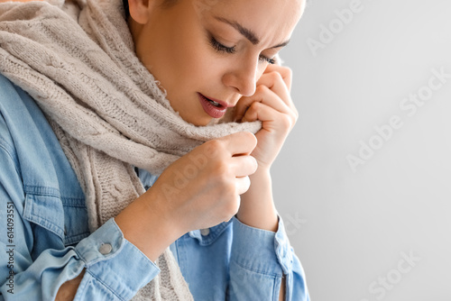 Ill young woman in bedroom,...