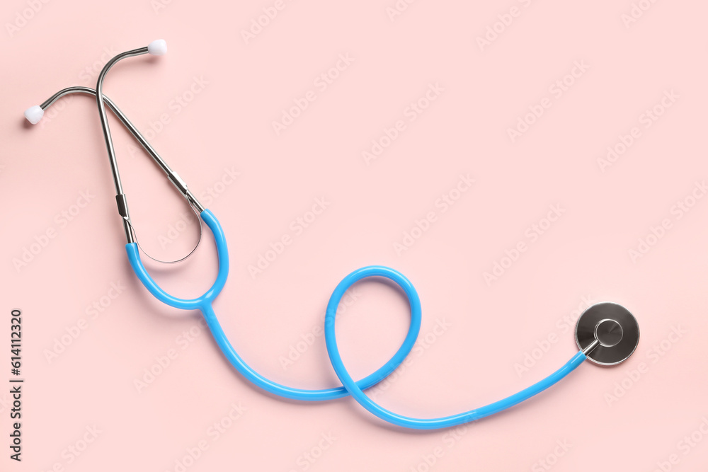 Modern stethoscope on pink background Modern stethoscope on pink background