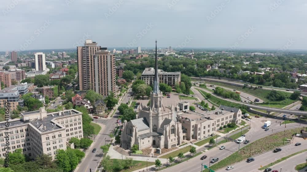 Aerial wide push-in shot of a gothic United Methodist church in Minneapolis, Minnesota. 4K Aerial wide push-in shot of a gothic United Methodist church in Minneapolis, Minnesota. 4K