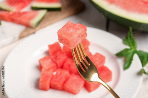 Plate with pieces of fresh watermelon and mint, closeup
