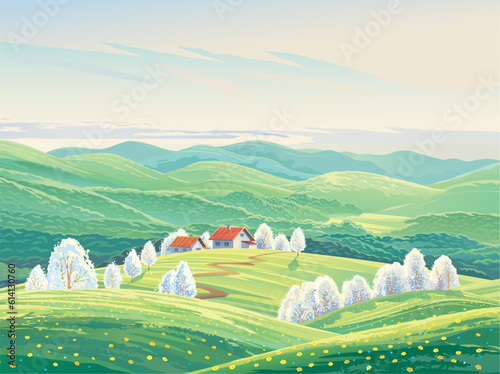 Spring rural landscape with hills and flowering fruit trees and also with a village in the background.