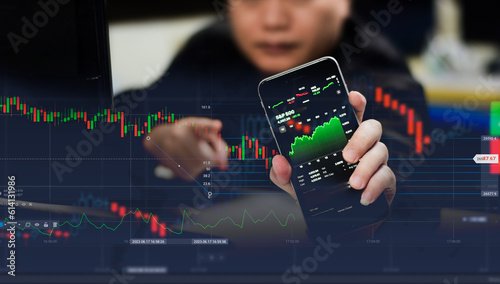 Wallpaper Mural Investing phone application, trader, investor, mutual fund, stock market and digital asset businessman analyzing financial data, forex trading charts, technology, finance, business and investing. Torontodigital.ca