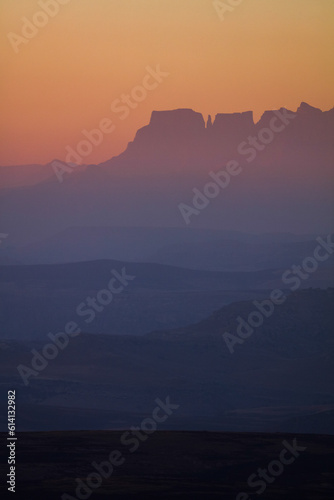 Sunrise over valley looking at the Drakensberg mountains