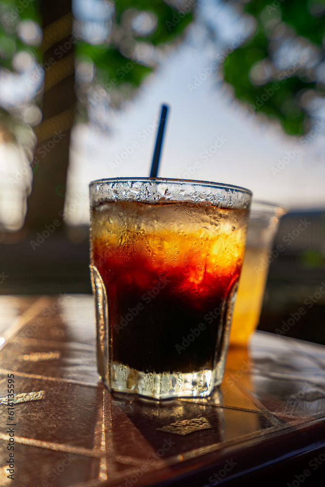 Delicious ice coffee americano on table. Delicious ice coffee americano on table.