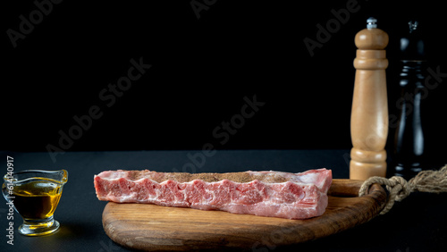 pork ribs with spices before cooking, restaurant menu concept and recipe photo