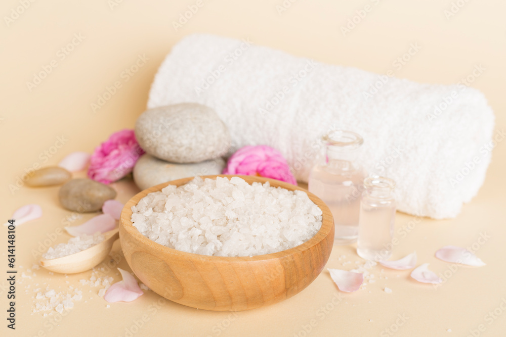 Spa composition with pink roses on wooden table