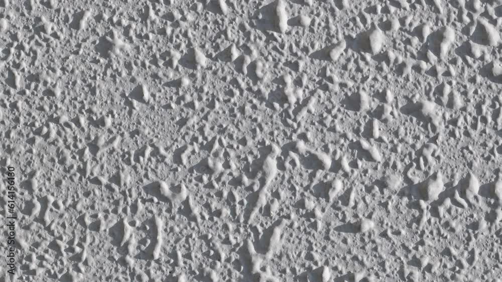 Wall white with curly decorative plaster drops, close-up, rotating, turning, macro
Wall white with curly decorative plaster drops, close-up, rotating, turning, macro