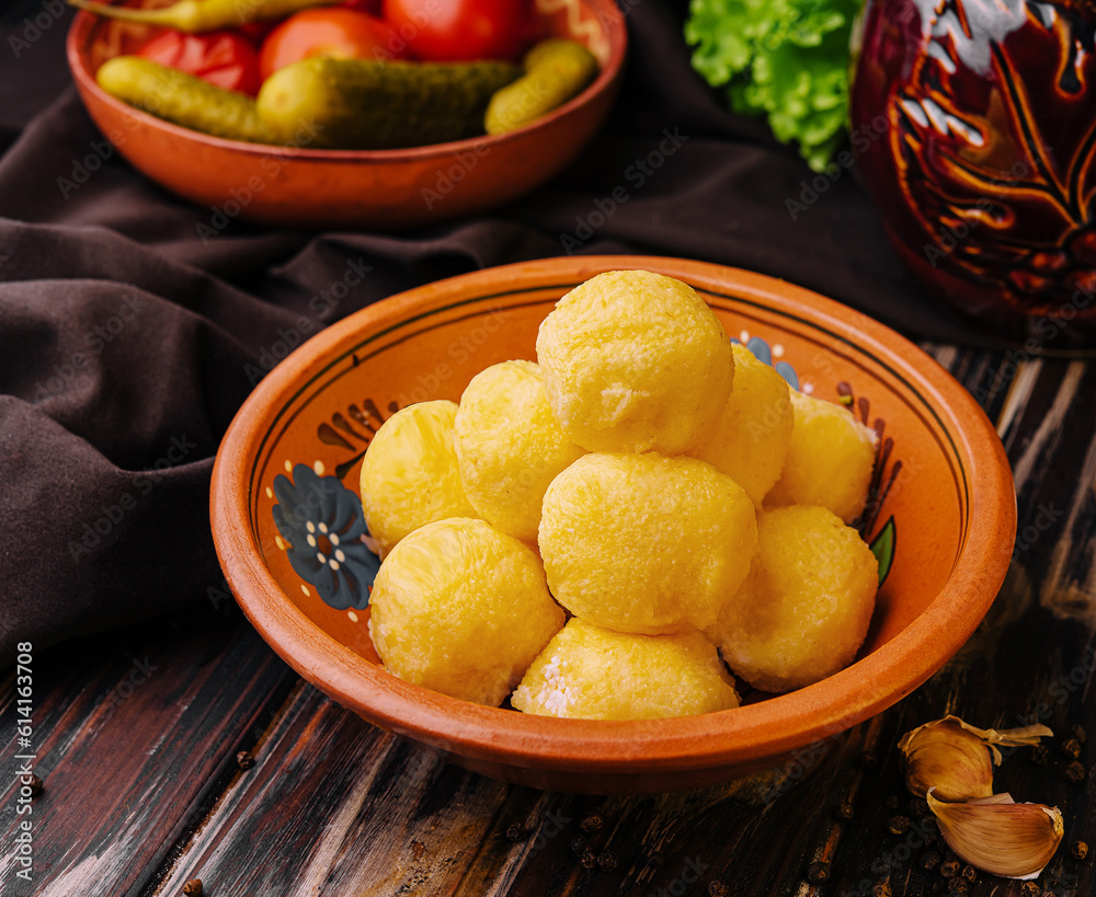 cheese balls with garlic inside in bowl cheese balls with garlic inside in bowl