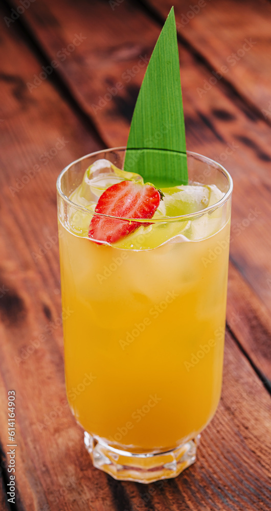 mai tai cocktail with pineapple and rum with a piece of strawberry mai tai cocktail with pineapple and rum with a piece of strawberry
