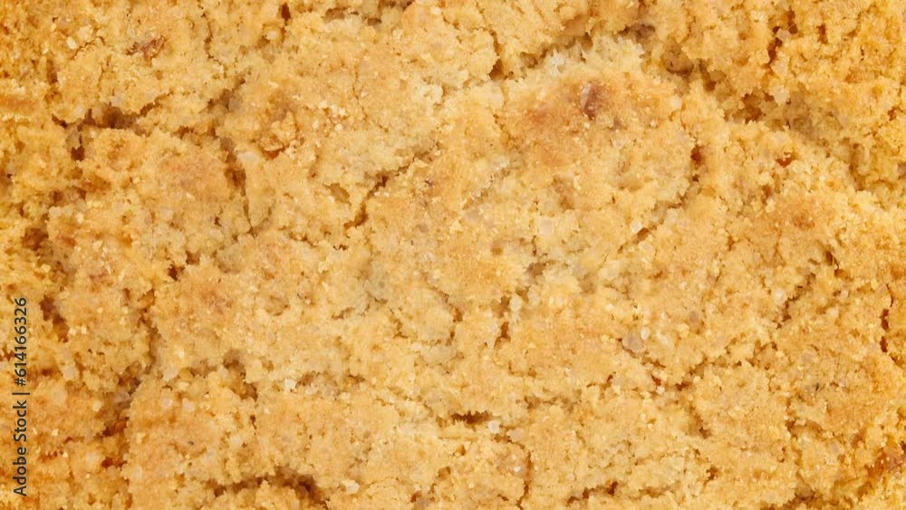 Oatmeal cookie one round, rotating, turning, close-up macro, top view
Oatmeal cookie one round, rotating, turning, close-up macro, top view