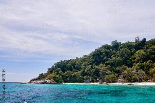 Snorkeling at clear turquoise water. Beautiful tropical bay. © luengo_ua