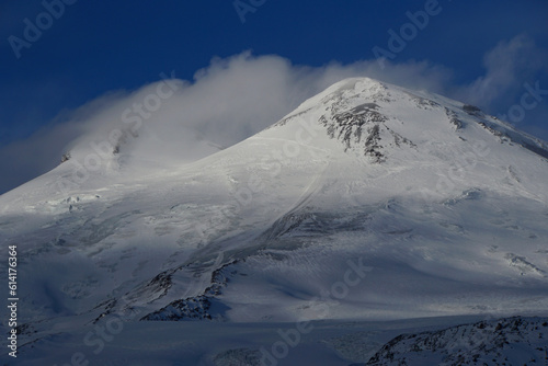 Evening Mount Elbrus with a blanket of clouds