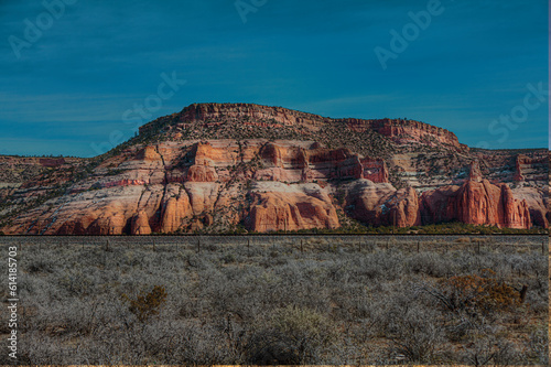 Lupton Painted Cliffs.  Large painted rock with many colorful layers in the Lupton Cliffs 