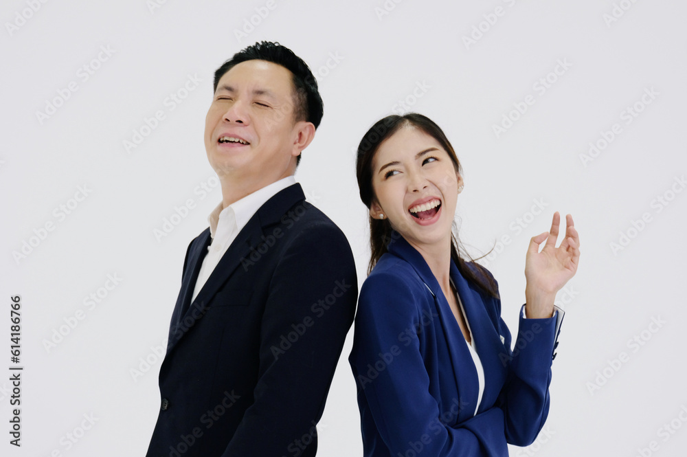 Young businesswoman and young businessman smiling on a white background. Young businesswoman and young businessman smiling on a white background.