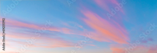Sky background with pink clouds at sunset. For print and graphic resources.