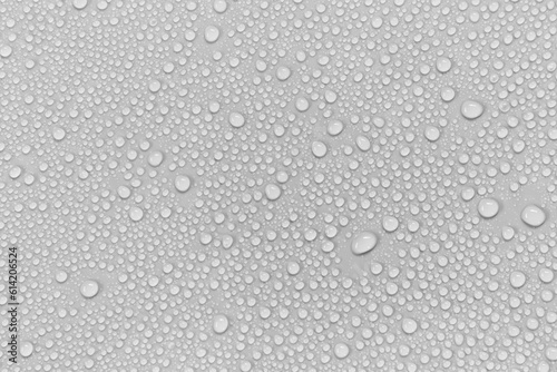 Water droplets on a gray background.