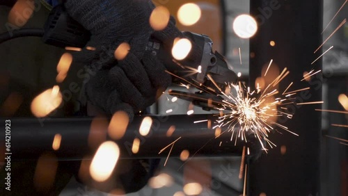 This stock video shows the sparks that fly when the angle grinder is working. This stock video will decorate your projects related to metalworking, angle grinder.