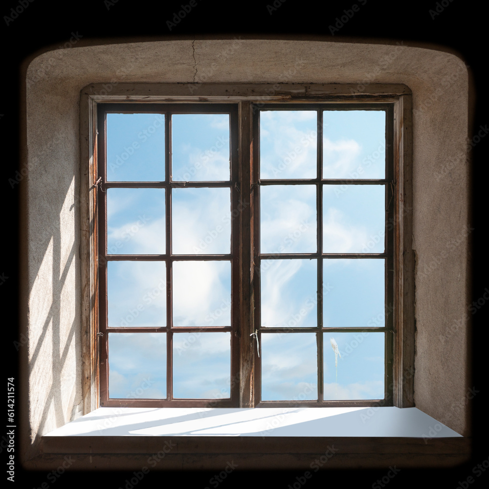 raditional wooden window frame seen from inside, bright blue sky outside. raditional wooden window frame seen from inside, bright blue sky outside.