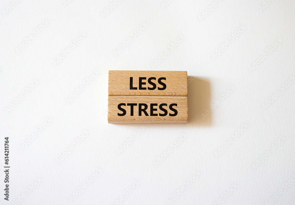 Less stress symbol. Wooden blocks with words Less stress. Beautiful white background. Healthcare and Less stress concept. Copy space. Less stress symbol. Wooden blocks with words Less stress. Beautiful white background. Healthcare and Less stress concept. Copy space.