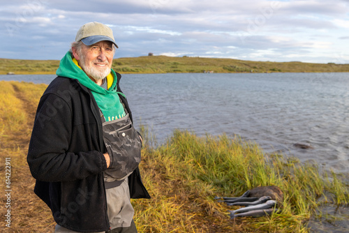 Canvas Print Friendly mature man outside in Alaskan tundra