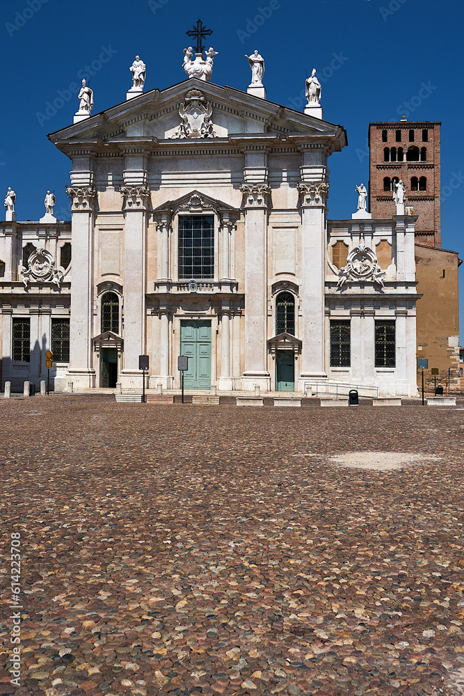 Baroque facade of the historic Cathedral of Saint Peter in the city of Mantua, Italy