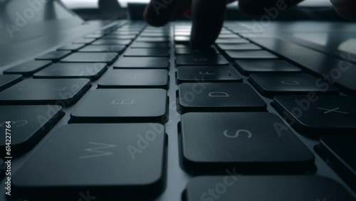 Close up of hands typing and coding on laptop keyboard. Digital innovation protection technology. Futuristic network server background. Blockchain crypto developer and binary program code concept