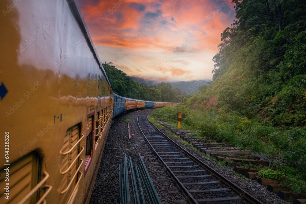 View from Indian train to unique and amazed nature scenic landscape of rain forest near Dudhsagar Falls. Goa, India. Tourism beautiful destination place. Discover India. Open world after covid-19