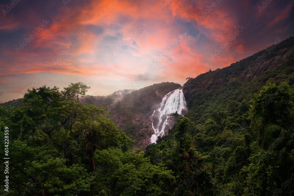 Unique and amazed nature scenic landscape of Dudhsagar Falls in rain forest. Sonaulim, Goa, India. Tourism beautiful destination place. Discover the beauty of earth. Open world after covid-19