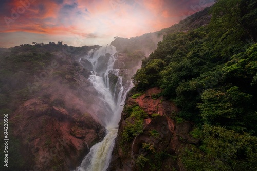 Unique and amazed nature scenic landscape of  Dudhsagar Falls in rain forest. Sonaulim  Goa  India. Tourism beautiful destination place.  Discover the beauty of earth. Open world after covid-19