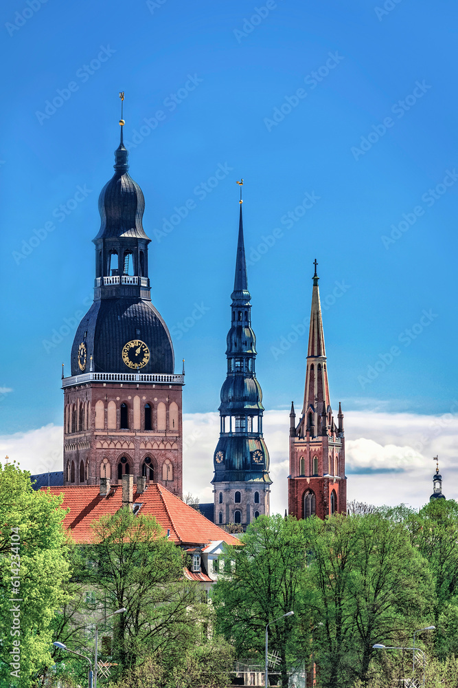 View of row of towers and spires in Riga, Latvia. Copy space in clear sky.