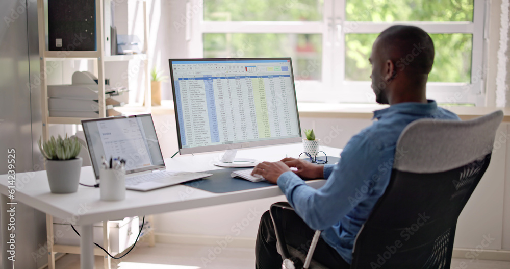 Data Analyst African Man Using Spreadsheet Data Analyst African Man Using Spreadsheet