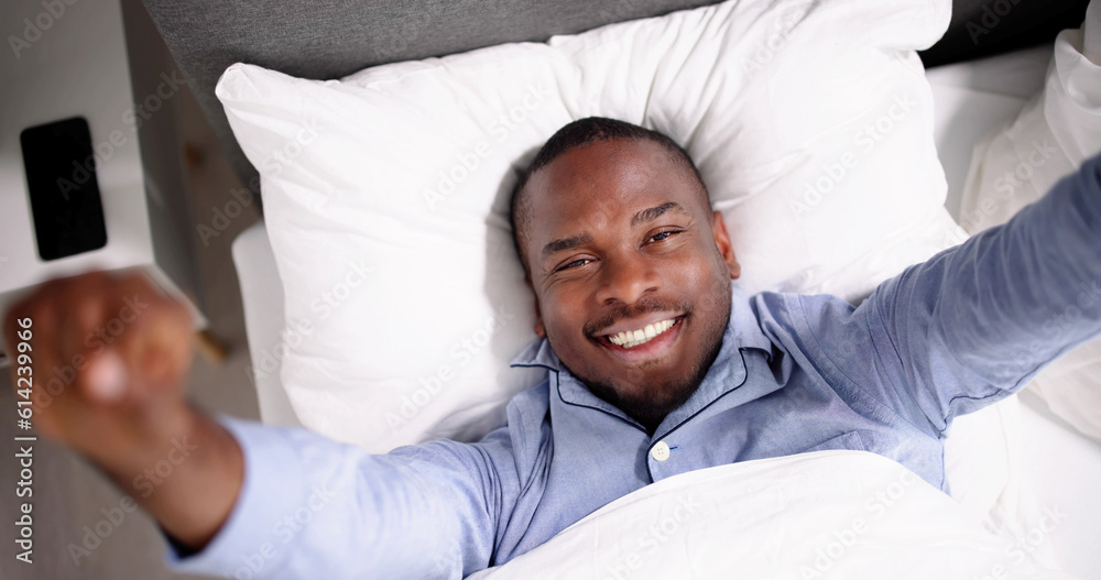 Young Happy Smiling African Man Waking Up