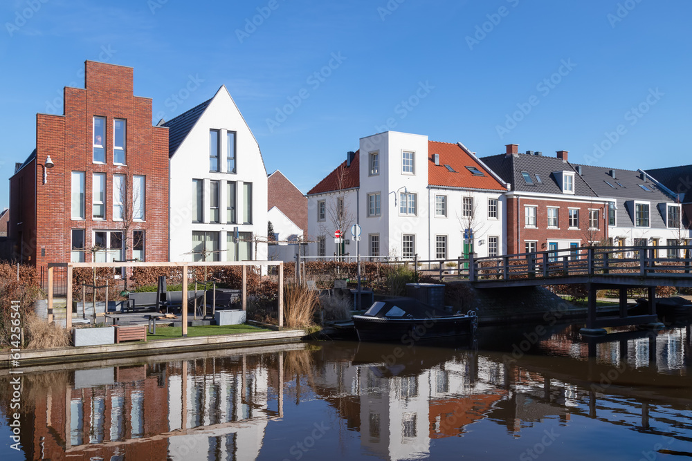 New modern residential buildings along the canal in the Vathorst district in Amersfoort.