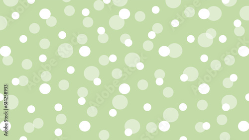 White dots on green background