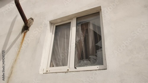 View broken window.Crash glass broken window house destroy building window crack