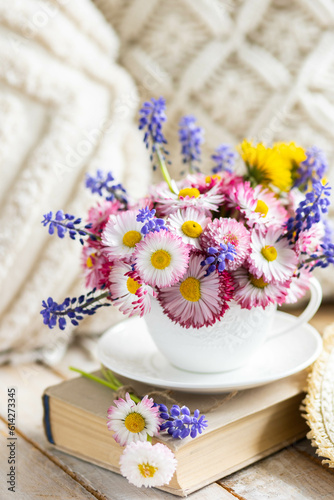 Greeting card for Women s or Mother s Day  8th of March. Beautiful spring or summer floral composition with daisy camomile flowers in a white cup for countryside table decor. Wooden background