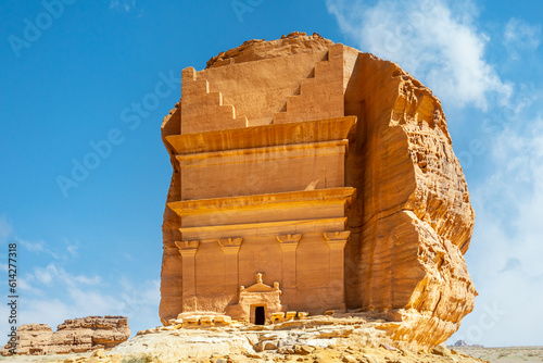 Entrance to the ancient nabataean Tomb of Lihyan, son of Kuza carved in rock in the desert,  Mada'in Salih, Hegra, Saudi Arabia photo