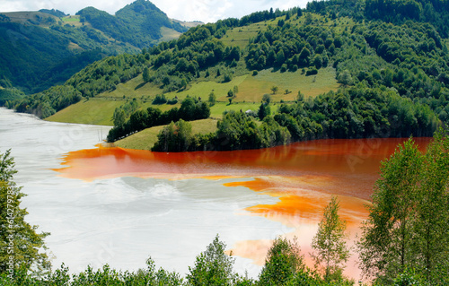 Red lake next to a copper mine in Apuseni mountains