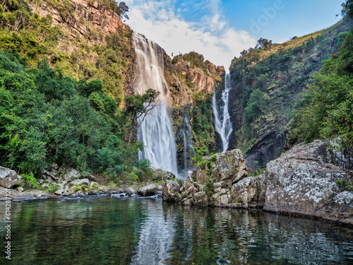 Lisbon Falls and its reflection on the Lisbon River with blue sky white clouds, Panorama Route, Mpumalanga, South Africa