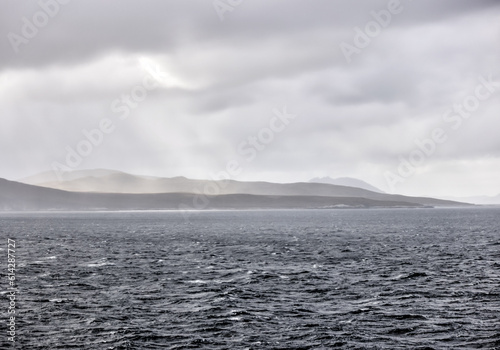 Fototapeta Naklejka Na Ścianę i Meble -  Dramatic skies, landscapes and weather off the coast of Cape Horn Argentina
