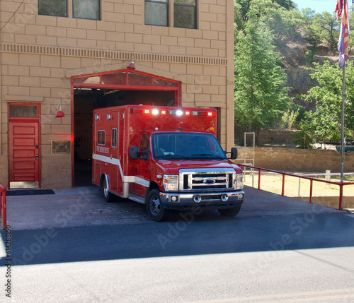 ambulance leaving the fire station to respond to a call for help