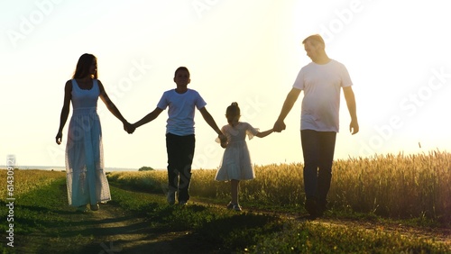 mother father child daughter son walk sunset, holding hands parents girl boy, happy family, wheat field, childhood dream, day off, jogging walk, parents child run sunset, concept cheerful childhood