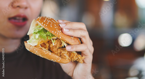 person eating burger